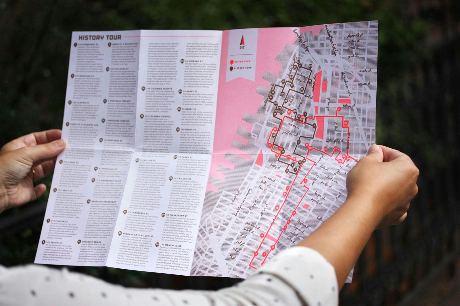 Photo of South Brooklyn Curiosity Map completely unfolded in a person's hand's.